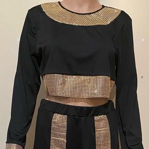 Sexy 2pc black outfit with gold like stones on it